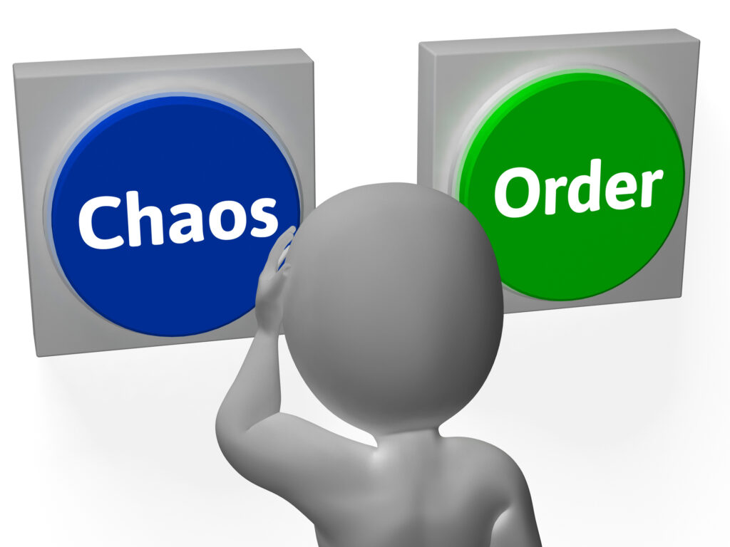 Depositphotos 32850363 L Data Organization for Small Businesses: First Steps to Manage Your Data 2 Business Automation Articles A 3D figure stands facing two buttons labeled "Chaos" and "Order," contemplating the balance between disorder and data organization for small businesses.